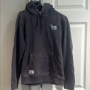 Men's GOAT USA men’s garment dyed blue hoodie.